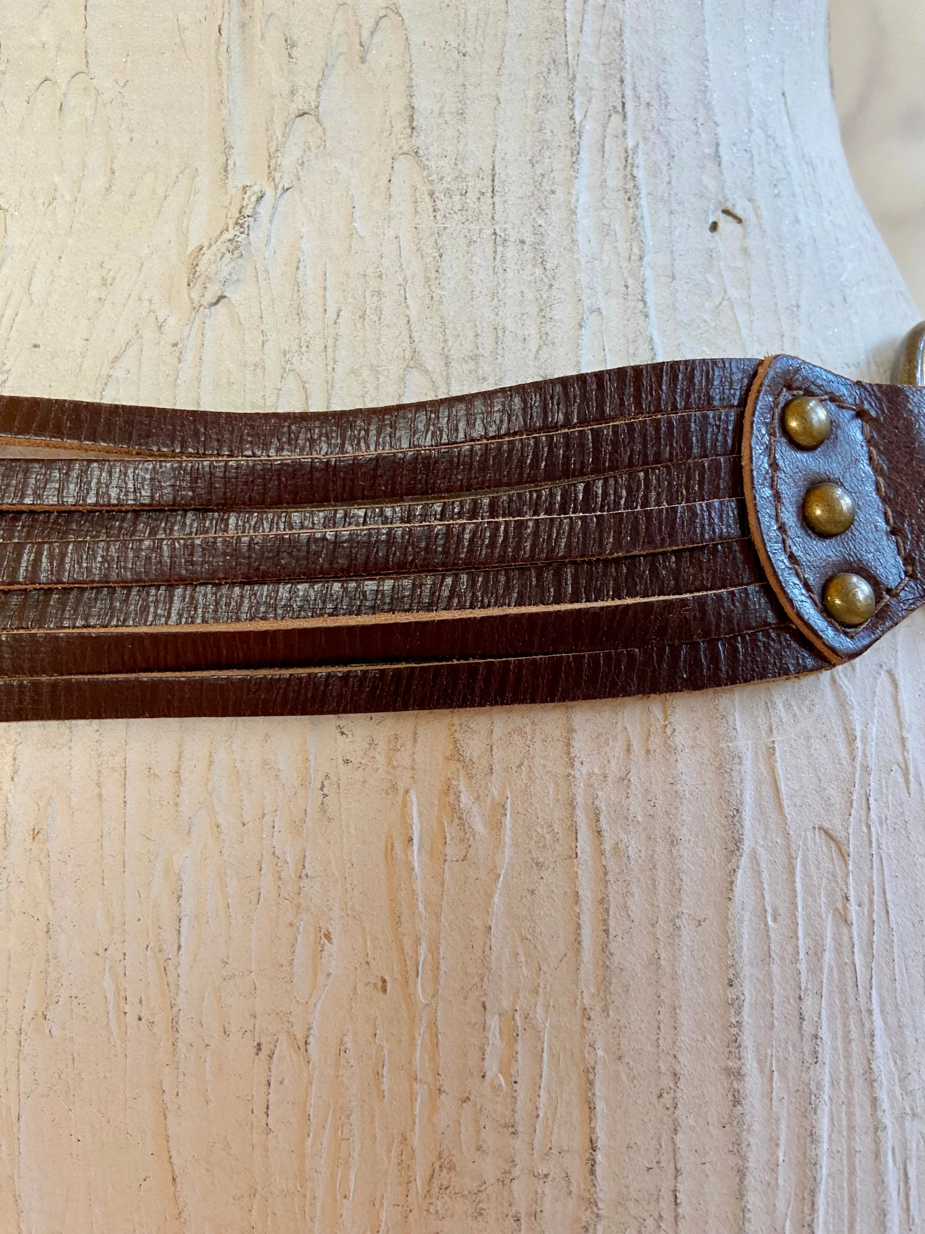 Big bronze buckle leather belt